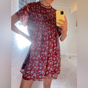 En crème dress - red with blue flowers and beaded neck size M